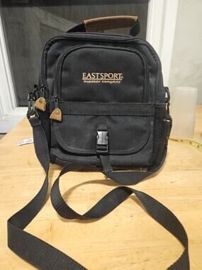 EASTSPORT Outdoor Company Black Crossbody Adjustable Strap Outer Pockets
